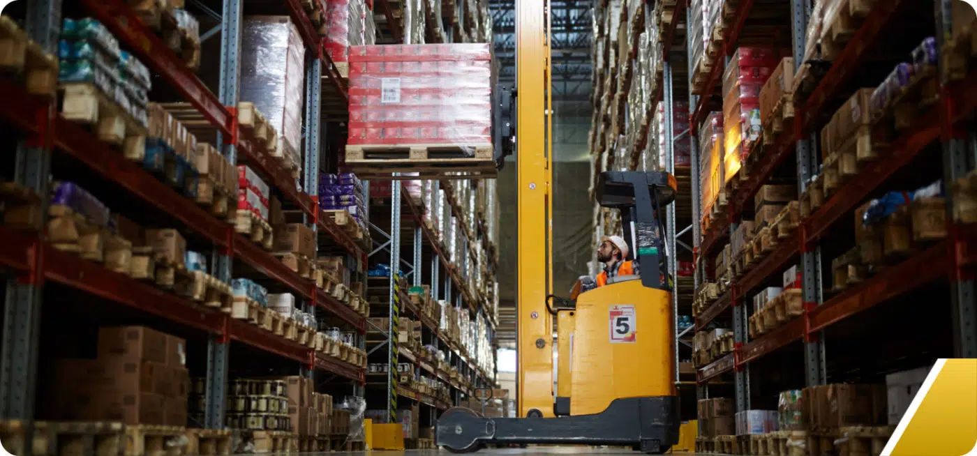Forklift being used in warehouse