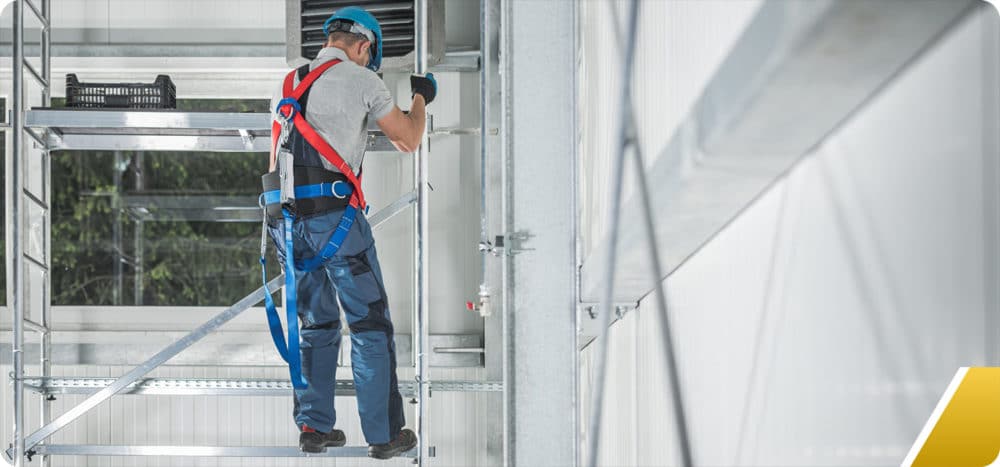 Worker on scaffolding