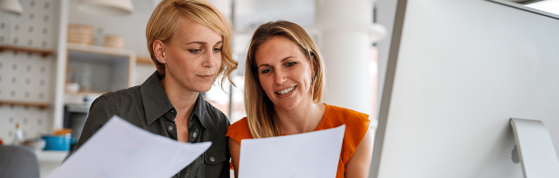 two women discussing work